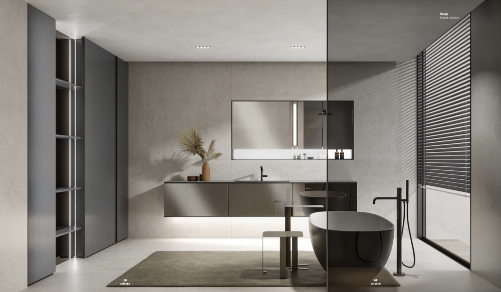 Edoné Bath-Living: colonne grigie con vani a giorno illuminati, mobile lavabo sospeso e vasca freestanding scura